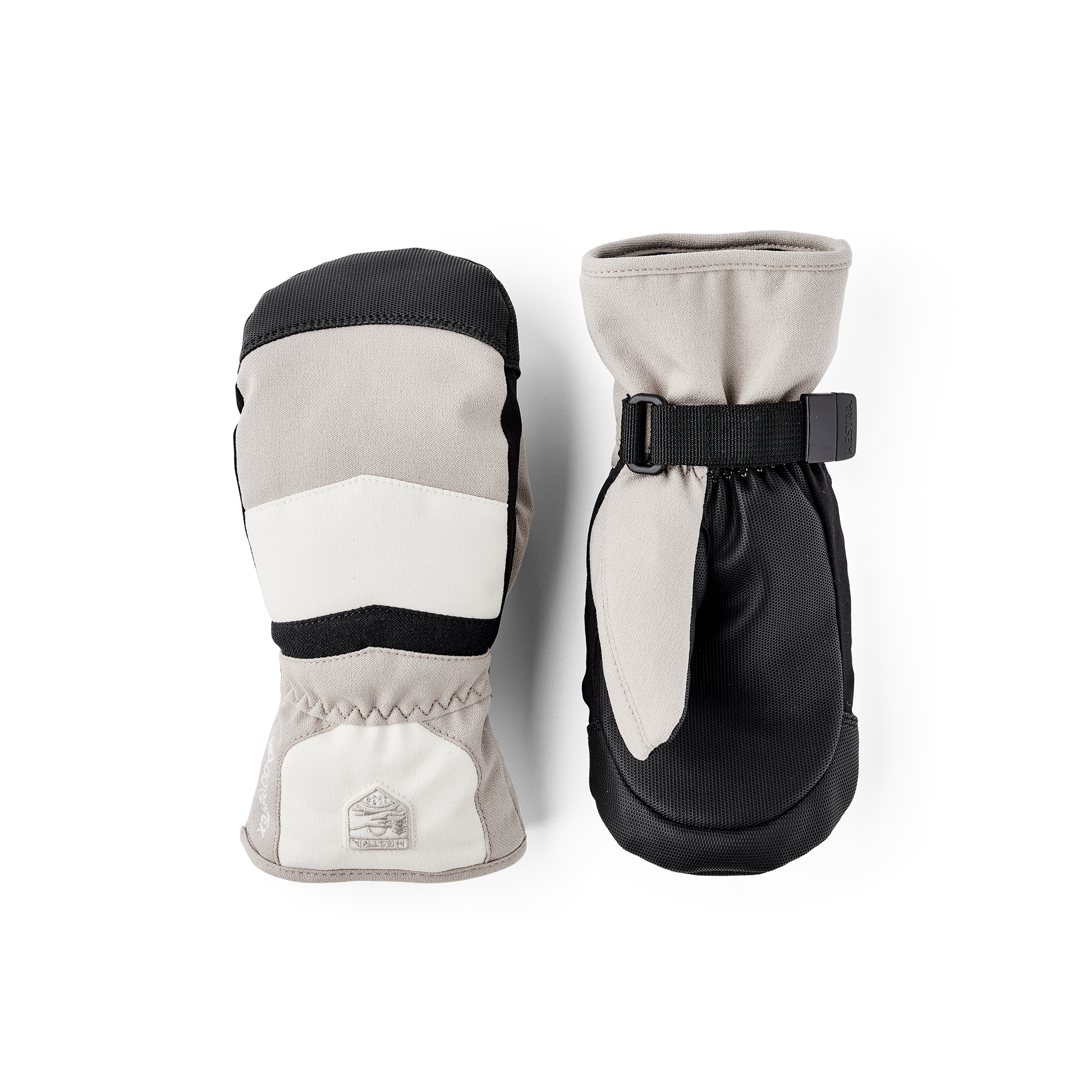 Beige and white fabric mitten with black synthetic palm and wrist adjustment