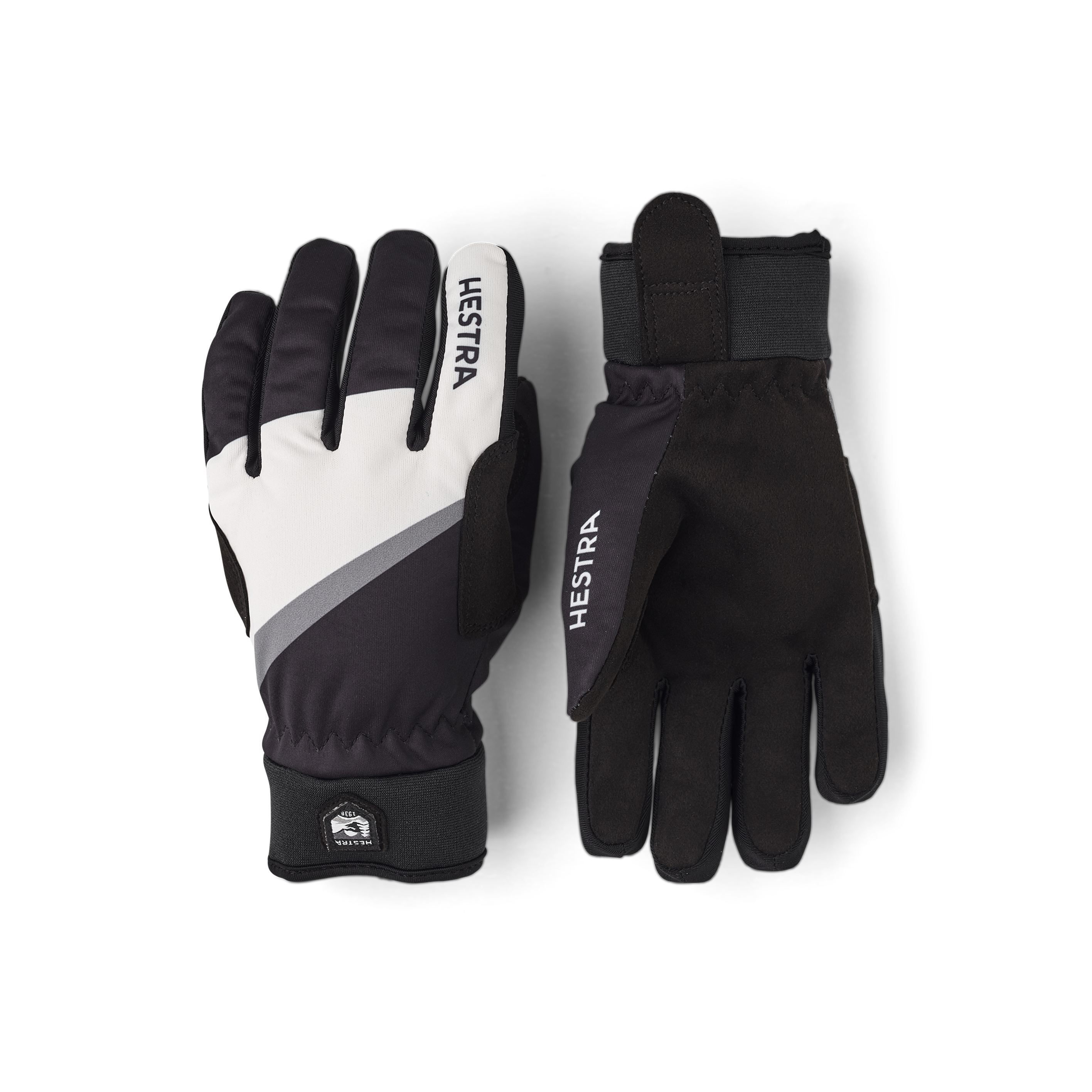 Black and white fabric cross-country ski glove with black synthetic suede palm