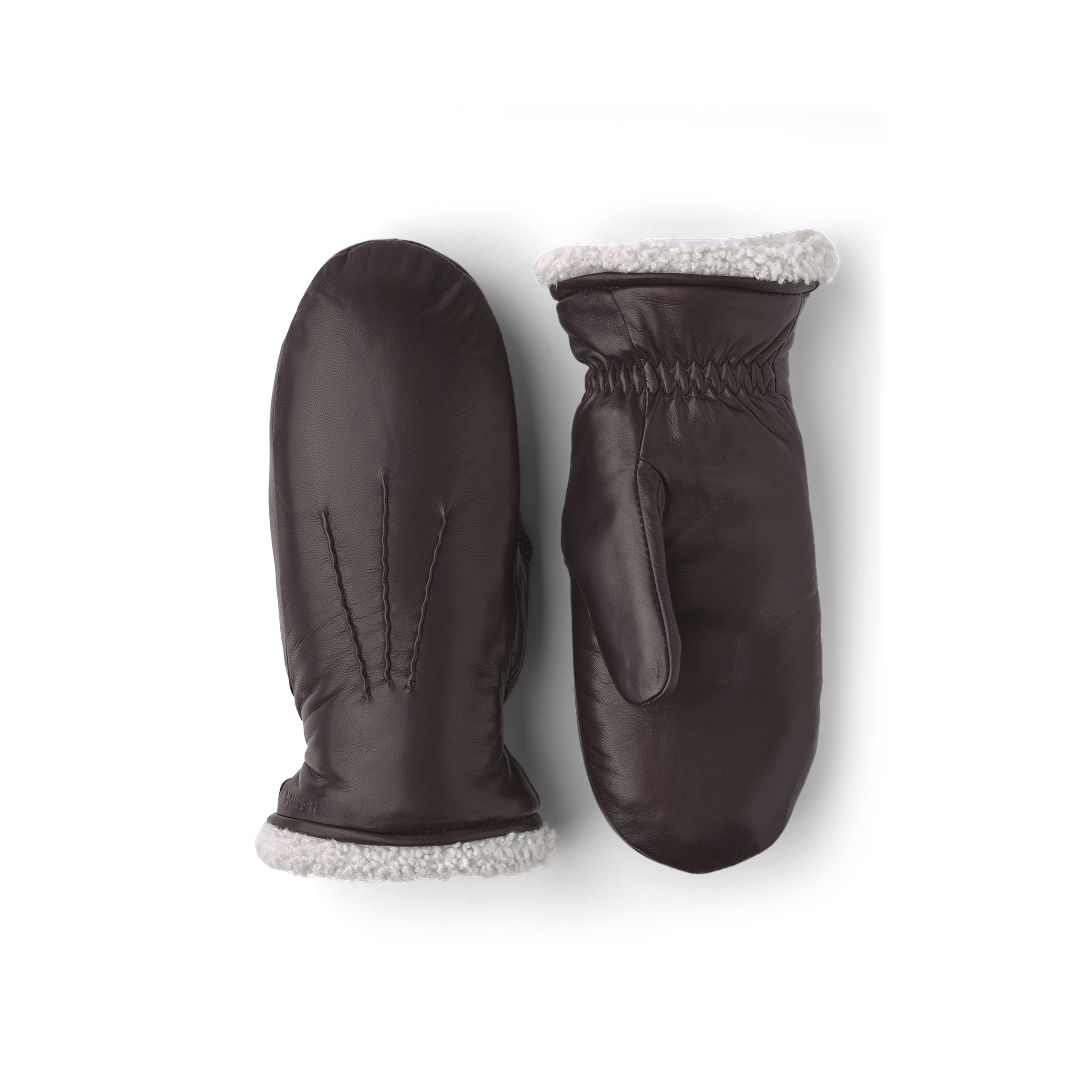 Dark brown machine-sewn hairsheep leather mitten with white fur trim